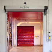 View of the Lion Nathan storage warehouse which door, gray