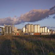 Lion's new HQ in South Auckland - Lion&apos;s city, cityscape, cloud, dusk, evening, horizon, meteorological phenomenon, real estate, residential area, sky, skyline, suburb, urban area, black