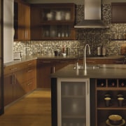 View of modern kitchen accessories in this traditional cabinetry, countertop, cuisine classique, interior design, kitchen, under cabinet lighting, brown, black