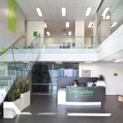 Schneider Electric reflects the latest energy options in architecture, daylighting, interior design, lobby, office, gray