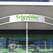 Schneider Electric reflects the latest energy options in architecture, building, commercial building, corporate headquarters, daytime, facade, metropolitan area, signage, sky, structure, gray