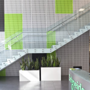 Schneider Electric reflects the latest energy options in angle, architecture, daylighting, glass, green, house, interior design, line, product, product design, wall, white, gray