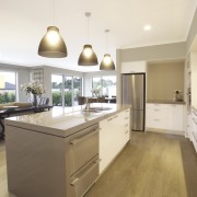 View of kitchen area at Platinum Homes show countertop, cuisine classique, interior design, kitchen, property, real estate, room, white, brown
