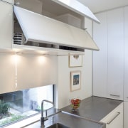 Modern kitchen features brilliant white panelling - Modern architecture, ceiling, countertop, daylighting, interior design, kitchen, real estate, white