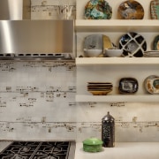 View of a kitchen which features white quartz countertop, furniture, interior design, kitchen, room, shelf, gray, brown