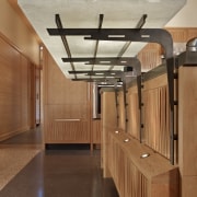 Close up view of the bar around the architecture, ceiling, floor, flooring, furniture, hardwood, interior design, wood, brown, orange