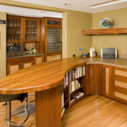 Interior view of the bar area within this cabinetry, countertop, desk, floor, flooring, furniture, hardwood, interior design, kitchen, room, table, wood, wood flooring, wood stain, orange, brown