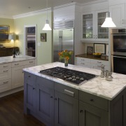 View of the traditional kitchen featuring bold cabinetry cabinetry, countertop, cuisine classique, kitchen, room, gray, black