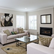View of lounge featuring sofas, glass-topped coffee table, furniture, home, interior design, living room, real estate, room, window, window covering, gray