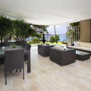 View of a covered patio which features tiled floor, interior design, real estate, gray