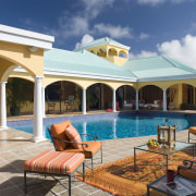 Poolside view of home - Poolside view of estate, hacienda, home, house, leisure, property, real estate, resort, swimming pool, vacation, villa