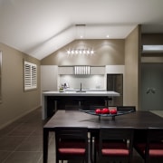 View of the dining and kitchen area of architecture, cabinetry, ceiling, countertop, interior design, kitchen, real estate, room, gray, black