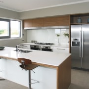 View of a kitchen which was designed by cabinetry, countertop, cuisine classique, interior design, kitchen, real estate, white, gray