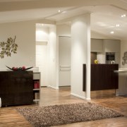 View of a kitchen designed by Toni Roberts ceiling, floor, flooring, furniture, hardwood, interior design, living room, lobby, room, wood flooring, gray, brown