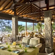 View of Four Seasons Seychelles high-end resort - dining room, interior design, outdoor structure, resort, restaurant, table, brown