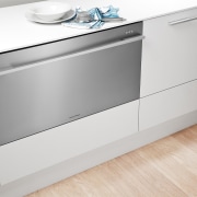 View of kitchen featuring appliances from Fisher &amp; angle, chest of drawers, countertop, drawer, floor, furniture, home appliance, kitchen, major appliance, product, product design, sideboard, white