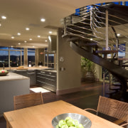 View of contemporary condominium kitchen which features aluminium countertop, interior design, kitchen, brown