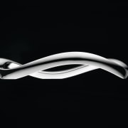 View of the E:Motion trivet from Electrolux which automotive design, black and white, computer wallpaper, font, monochrome, monochrome photography, product design, still life photography, black