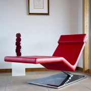 View of living area which features leather lounger chair, chaise longue, couch, floor, furniture, interior design, outdoor furniture, product design, red, table, gray