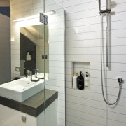 Bathroom with white wall tiles, white vanity with bathroom, floor, interior design, plumbing fixture, product design, room, sink, tap, tile, wall, gray, white