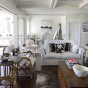 Interior view of a Sydney beach house by ceiling, floor, home, interior design, living room, room, table, gray