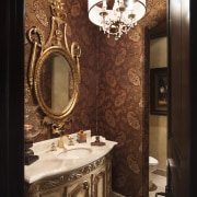 Bathroom vanity with ornate mirror and chandelier - bathroom, ceiling, interior design, room, wall, brown, black