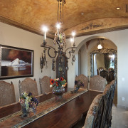 Dining room with arched ceiling, dining table and ceiling, dining room, estate, home, interior design, living room, room, table, wall, brown, orange