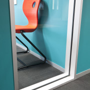 Close-up view of this office entrance way - blue, chair, floor, flooring, furniture, glass, line, product, product design, teal