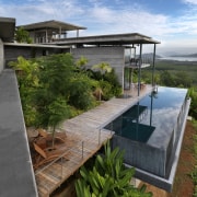 View of modern home designed by Design Unit architecture, backyard, cottage, home, house, outdoor structure, property, real estate, roof, brown