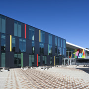 Exterior view of the Albany Senior High School architecture, building, commercial building, corporate headquarters, facade, mixed use, residential area, sky, structure, blue