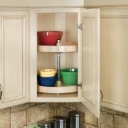 View of cabinetry which features storage systems from bathroom, bathroom accessory, bathroom cabinet, floor, furniture, interior design, plumbing fixture, room, shelf, shelving, sink, orange