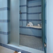 View of shower enclosure with blue wall tiling bathroom, plumbing fixture, room, teal