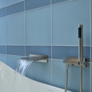 View of shower enclosure with blue wall tiling angle, azure, bathroom, floor, glass, line, plumbing fixture, product design, tap, tile, wall, teal, gray
