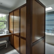 View of bathroom which features a make-up vanity. interior design, brown, gray