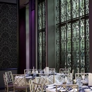 View of the interior which features dining furniture interior design, restaurant, wall, window, black