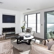 View of lounge featuring sofas, oak floors, rug, home, interior design, living room, property, real estate, room, window, gray, white