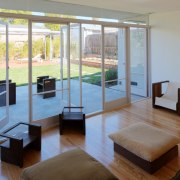 View of this contemporary home that was remodeled floor, flooring, interior design, real estate, window, wood, gray