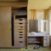 View of this contemporary home that was remodeled cabinetry, chest of drawers, cupboard, furniture, product, room, wardrobe, wood, brown