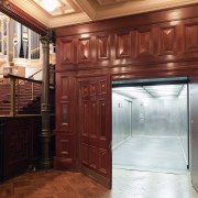 View of lifts in the renovated historic Sydney cabinetry, door, hardwood, home, interior design, real estate, wood, wood stain, red