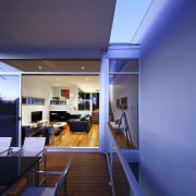 View of covered deck area in a contemporary architecture, ceiling, house, interior design, blue