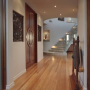 View of the stairway at the end of apartment, ceiling, estate, floor, flooring, hall, hardwood, home, interior design, laminate flooring, property, real estate, room, wood, wood flooring, brown, gray