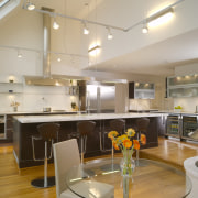 View of contemporary kitchen which features island, stainless apartment, architecture, ceiling, countertop, interior design, kitchen, loft, real estate, gray, brown