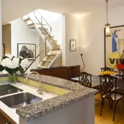 View of this contemporary home remodeled by Eleven home, interior design, real estate, room, table, white, brown