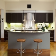 View of this contemporary home remodeled by Eleven cabinetry, countertop, cuisine classique, dining room, interior design, kitchen, room, table, orange