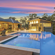 View of this contemporary home by Balmoral Homes backyard, cottage, estate, home, house, leisure, property, real estate, resort, swimming pool, villa, brown