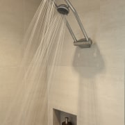 View of renovated bathroom which features glass shower plumbing fixture, product design, shower, tap, orange, brown