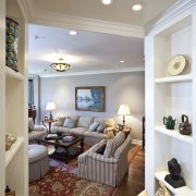 Interior view of this remodeled traditional condo by ceiling, home, interior design, living room, room, wall, gray