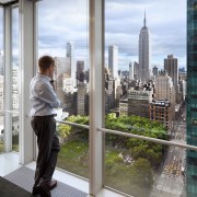 Interior view of windows overlooking Manhattan in the building, city, condominium, glass, reflection, skyscraper, tower block, urban area, window, gray, white
