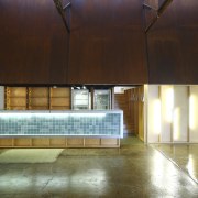 View of the bar on the lower level architecture, ceiling, daylighting, floor, flooring, interior design, light, lighting, lobby, wood, brown