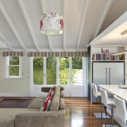 View of this home with unique design - ceiling, daylighting, home, house, interior design, living room, real estate, room, window, gray